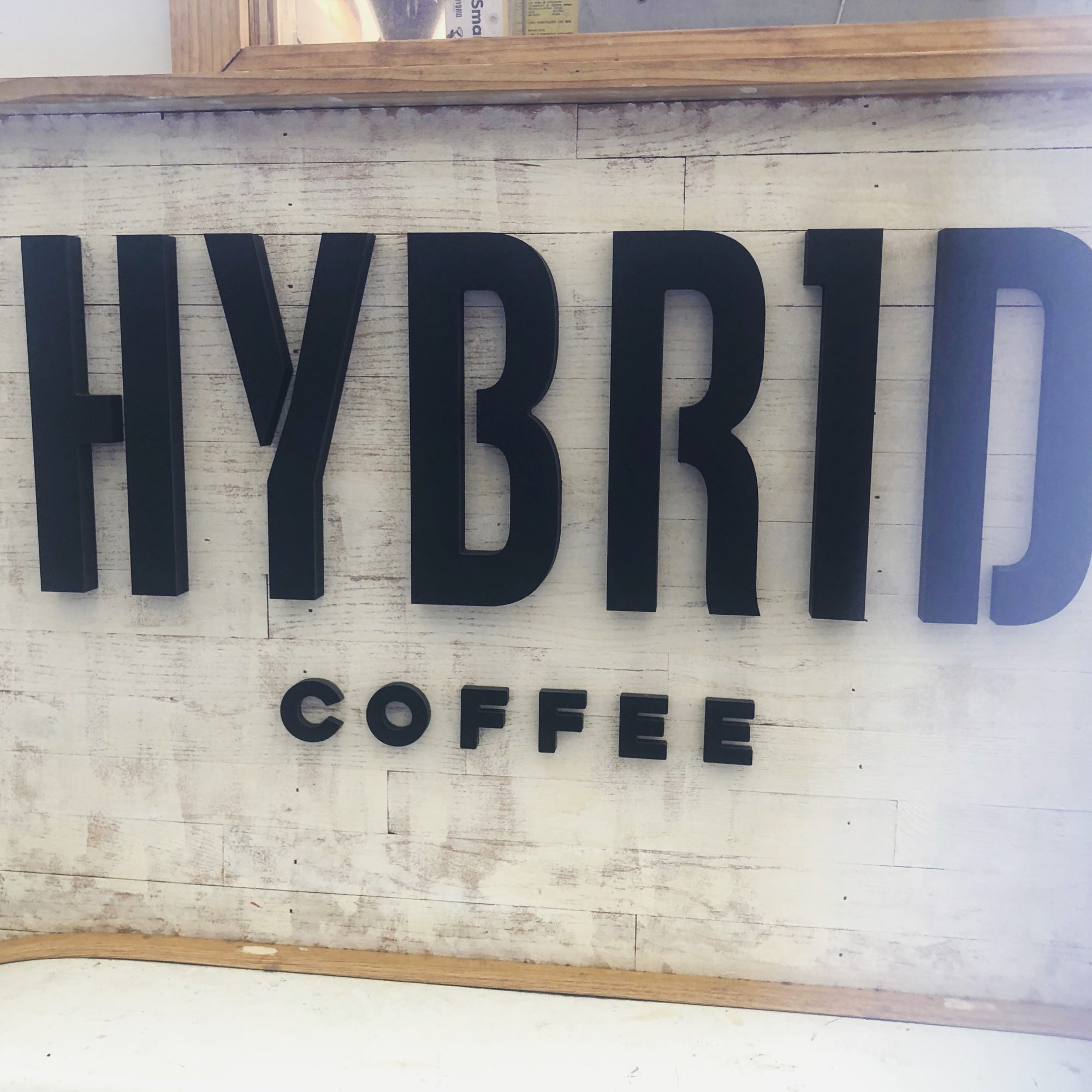 hybrid coffe sign