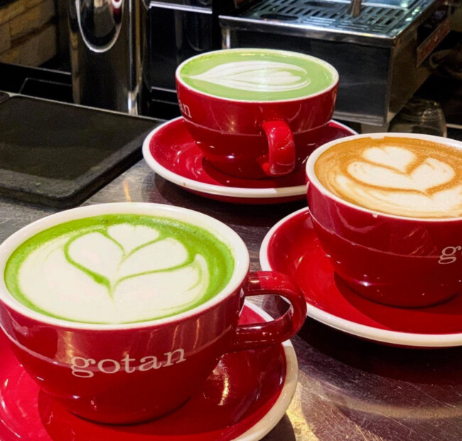 coffee drinks in red Gotan Coffee mugs