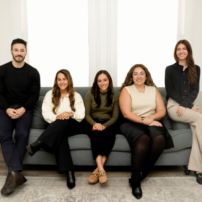 The Hoboken Wellness Counseling team on a couch