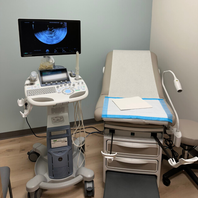 Patient room with medical device at CCRM Fertility 