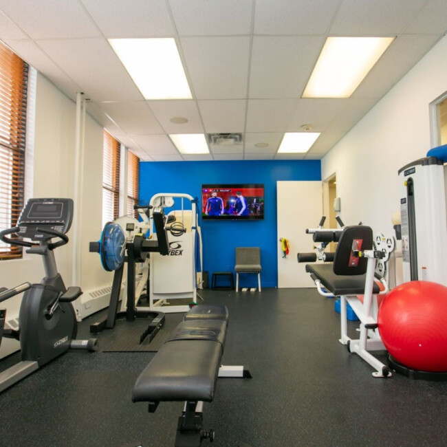 Treatment room with fitness equipment
