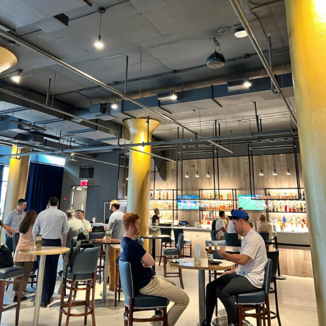 Interior view of The District with people sitting at tables